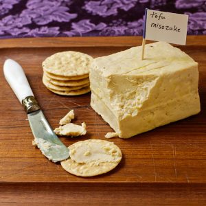 Tofu misozuke with crackers and spreading knife