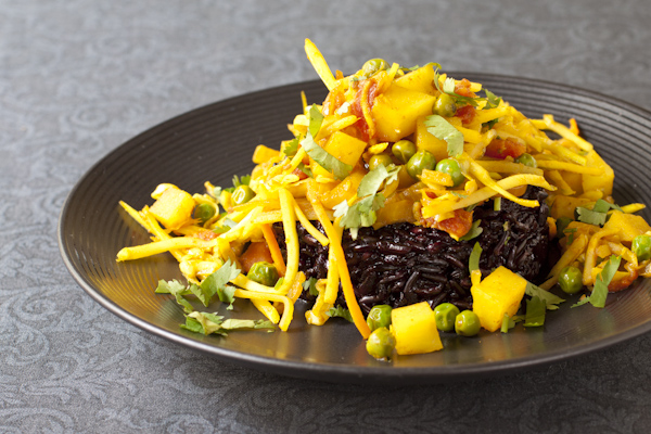 Curried cabbage with potatoes and green peas