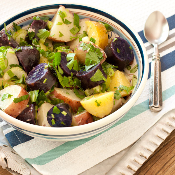 Red, white, and blue potato salad with peppery radish dressing from Recipe Renovator | Bright, fresh, herby as well as gluten-free, low-sodium, and dairy-free. Can easily be vegan.
