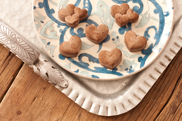 Sweet sun-carob hearts on a blue and white plate.